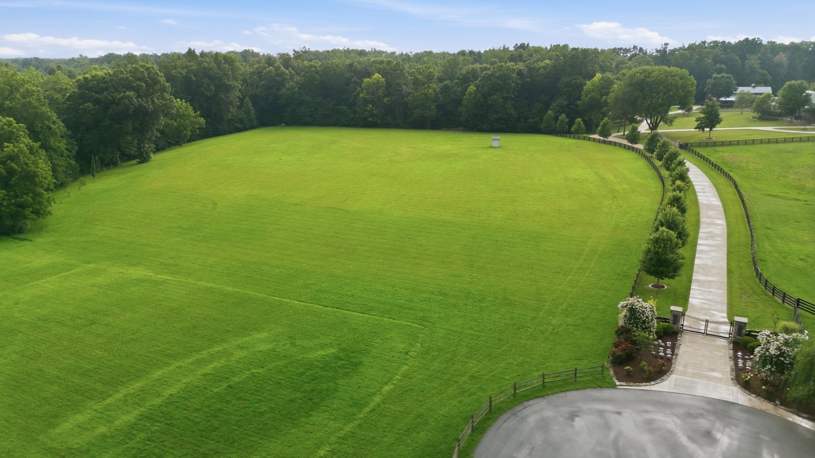 Open pasture and woods on acreage in Williamson County near Leiper's Fork
