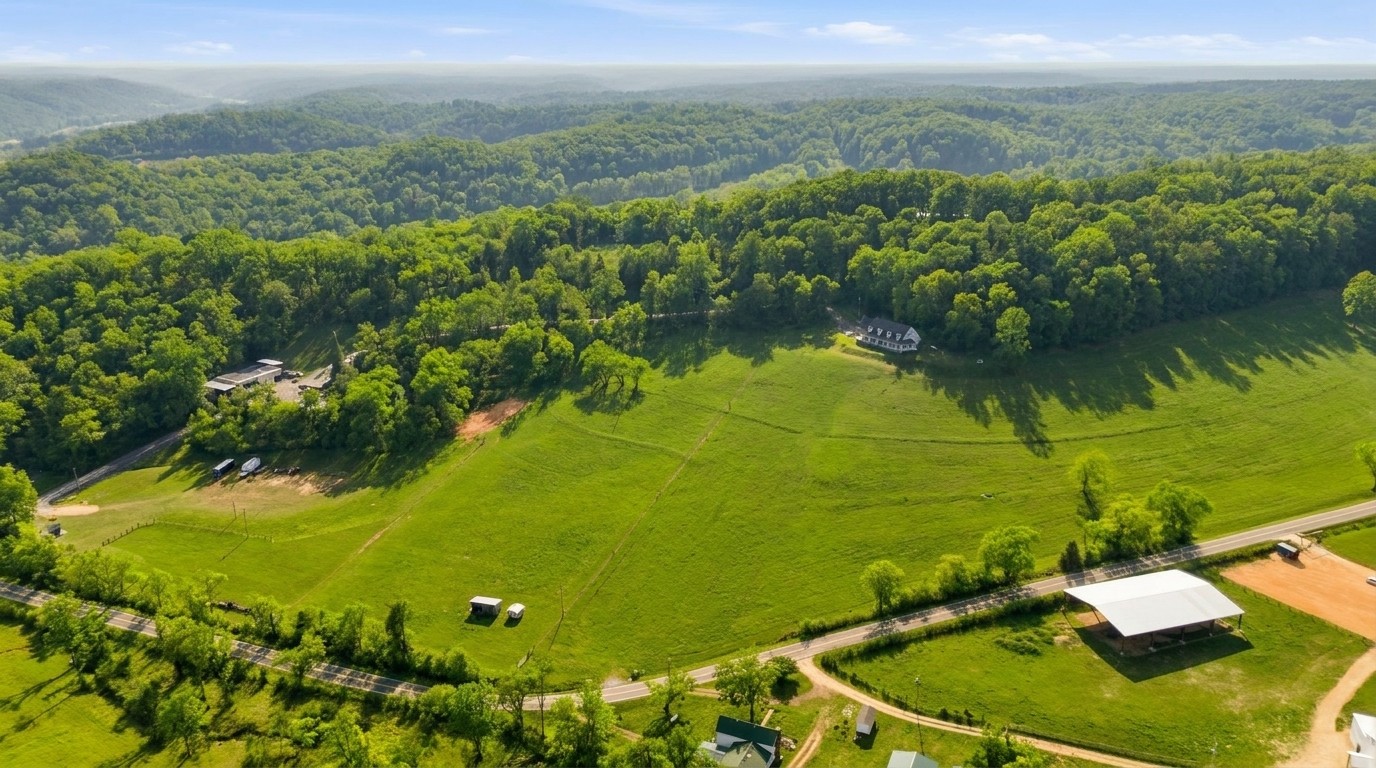 High aerial showing the full 40 acre property and road frontage
