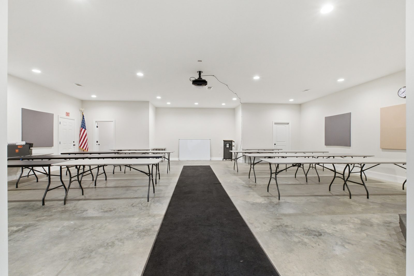 The large finished meeting space on the lower level